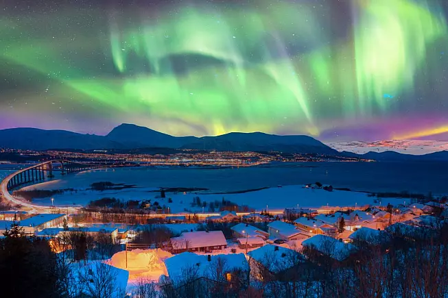 Tromso, Norvegia. Aurora boreale nel cielo. iStock-1611638149